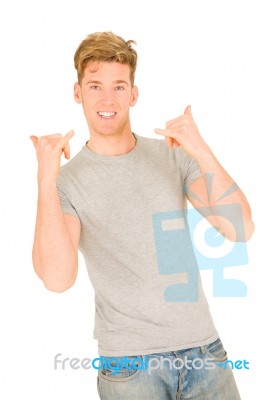 Young Man Showing hang loose sign Stock Photo