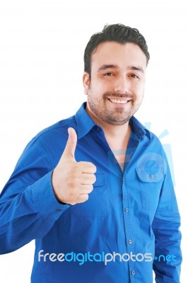 Young Man Showing Thumb Up Stock Photo