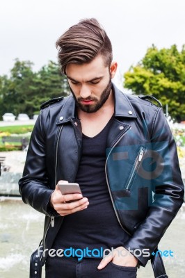 Young Man Texting Stock Photo