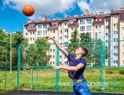 Young Man Training In Basketball Stock Photo