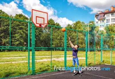 Young Man Training In Basketball Stock Photo