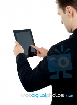 Young Man Using Tablet Pc Stock Photo