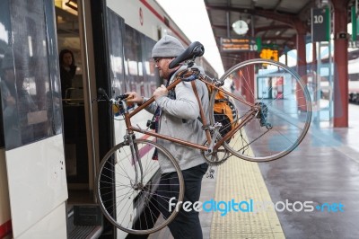 Young Man With A Bike Stock Photo