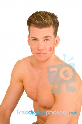 Young Man With Imprint Of Kiss Stock Photo