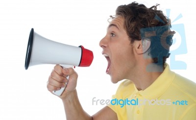 Young Man With Megaphone Stock Photo