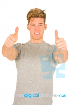 Young Man With Thumbs Up Stock Photo