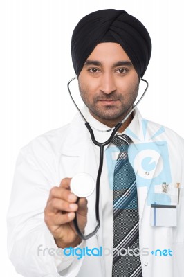 Young Medical Expert Ready To Examine Stock Photo