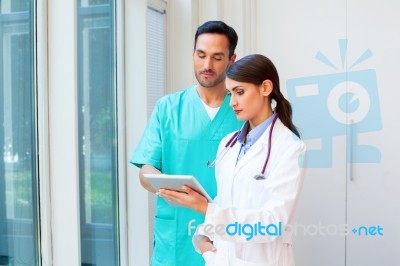 Young Medical Team Using Digital Tablet Stock Photo