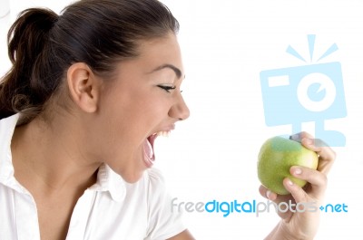 Young Model Going To Eat Apple Stock Photo