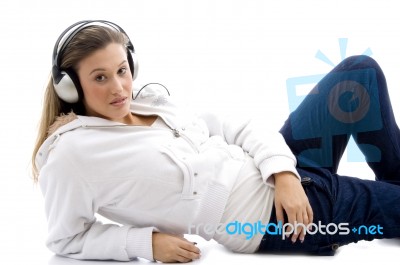 Young Model Listening Music With Headphones Stock Photo