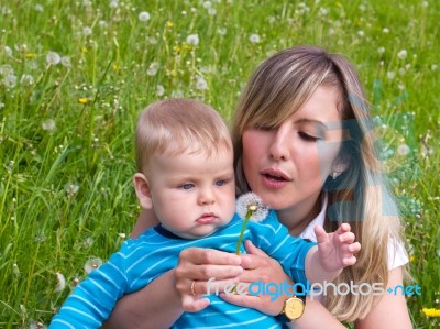 Young Mother With Her Son Stock Photo