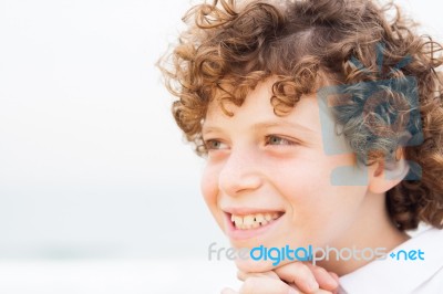 Young Pretty Boy Posing At Beach Stock Photo