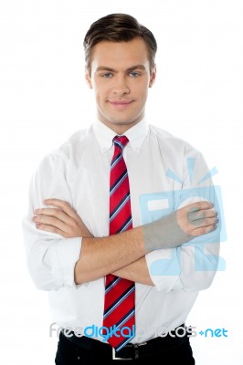 Young Professional Folded Arms Stock Photo