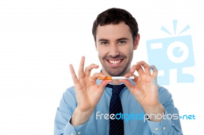 Young Professional Posing With Cigarette Stock Photo