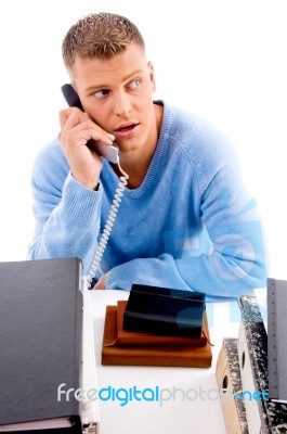 Young Professional With Phone Looking Aside Stock Photo