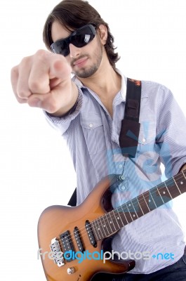 Young Rock Star Posing With Guitar Stock Photo