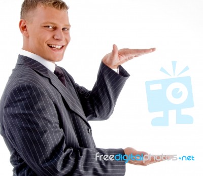 Young Smiling Businessman Measuring Stock Photo