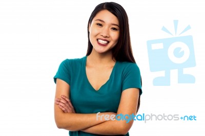 Young Smiling Chinese Model Posing Casually Stock Photo