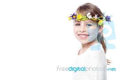 Young Smiling Girl Wearing Flower Wreath Stock Photo