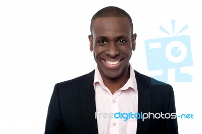 Young Smiling Relaxed Corporate Guy Stock Photo