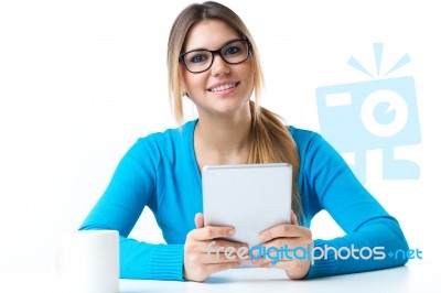 Young Smiling Woman Using Digital Tablet. Isolated On White Stock Photo