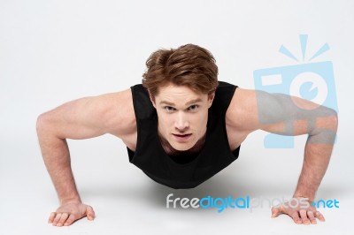 Young Sport Man Doing Exercises Stock Photo