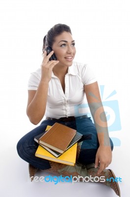 Young Student Busy On Phone Call Stock Photo