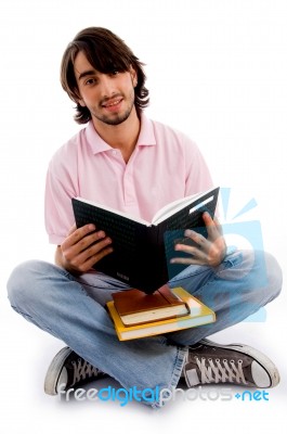 Young Student holding books Stock Photo