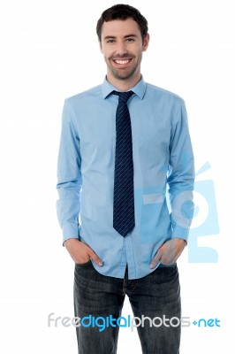 Young Stylish Smiling Sales Executive Stock Photo