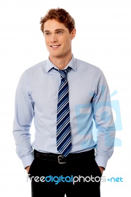 Young Stylish Smiling Sales Executive Stock Photo