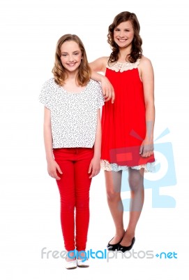 Young Teenage Sisters Standing Stock Photo