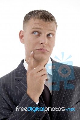 Young Thinking Businessman Stock Photo