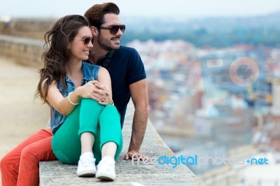 Young Tourist Couple Looking At The Views In The City Stock Photo