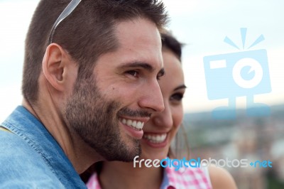 Young Tourist Couple Looking At The Views In The City Stock Photo