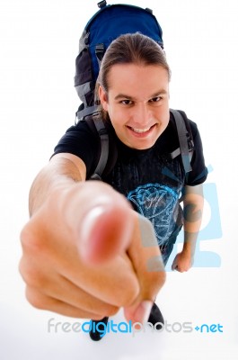 Young Traveler With Pointing Up Stock Photo