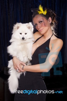 Young Widow Woman In Black And White Dog Stock Photo