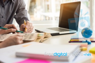 Young Woman And Man Studying For A Test/ An Exam. Tutor Books Wi… Stock Photo