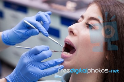 Young Woman At The Dental Office Stock Photo