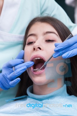 Young Woman At The Dental Office Stock Photo