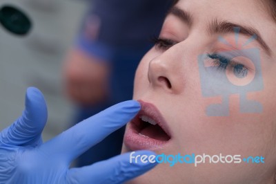 Young Woman At The Dental Office Stock Photo