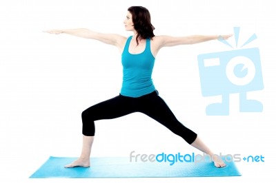 Young Woman Doing Exercise Stock Photo