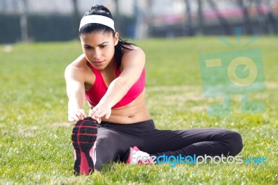 Young Woman Doing Stretching Stock Photo