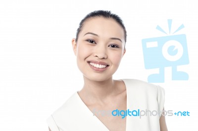 Young Woman Flashing A Smile Stock Photo