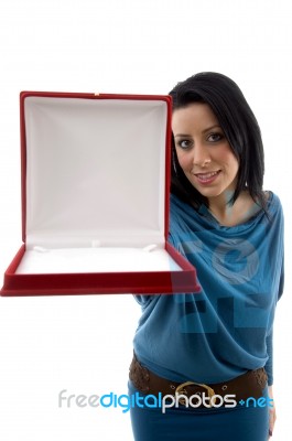 Young Woman Giving Jewelry Box Stock Photo