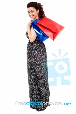 Young Woman Holding Shopping Bag Stock Photo