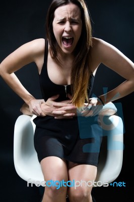 Young Woman In A Chair Caught By A Male Arms. Concept Of Oppress… Stock Photo