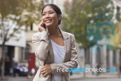 Young Woman In The City Stock Photo