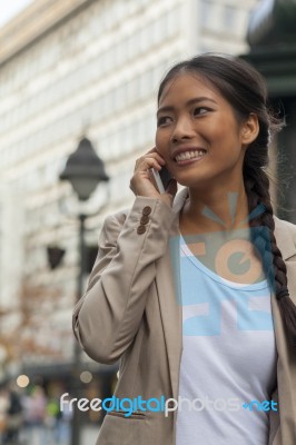 Young Woman In The City Stock Photo