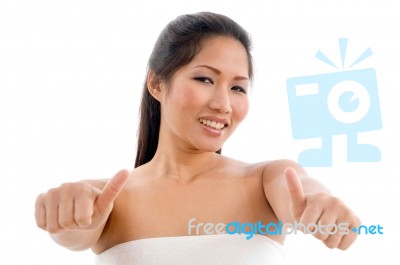 Young Woman In Towel Showing Thumb Up Stock Photo