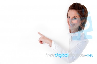 Young Woman Laughing By A Blank Board Stock Photo